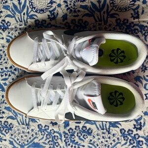 Nike White Low-Top Sneakers with Neon Green Insole